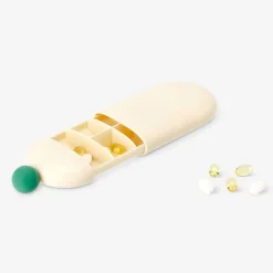 Pill organiser with slide mechanism
