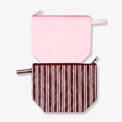 Pink and brown toiletry bags