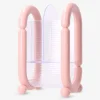 Pink cosmetic organiser for makeup brushes
