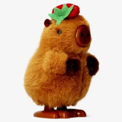 Wind up capybara with strawberry hat